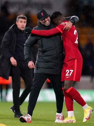 Jurgen Klopp celebrates with Divock Origi after Liverpool's 1-0 win at Wolves.