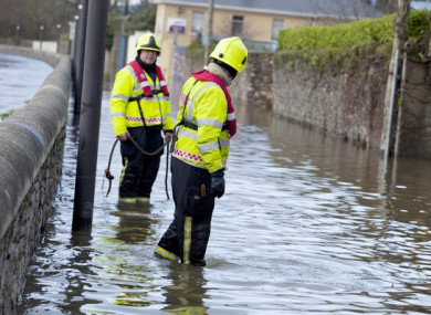 Emergency services in Carrick on Suir after the River Suir burst its banks and flooded part of the town during Storm Frank, 2015