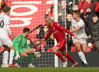 Fabinho celebrates scoring the opener at Anfield.