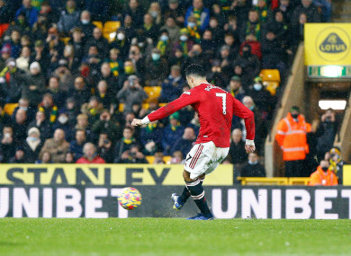 Cristiano Ronaldo scores a penalty.