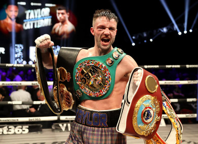 Josh Taylor celebrate victory in the junior welterweight bout against Jack Catterall.