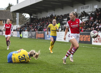 Arsenal's Katie McCabe retains possession.