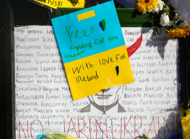 Flowers and messages of support that have been left outside the Embassy of Ukraine in Dublin