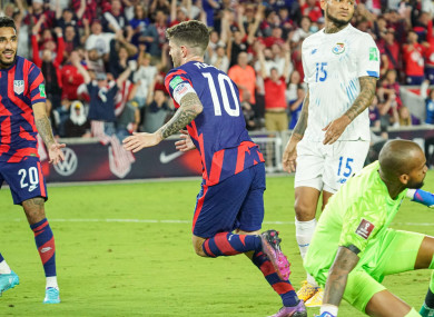 Christian Pulisic #10 celebrates after scoring in the 2022 World Cup Qualifier at Exploria Stadium.