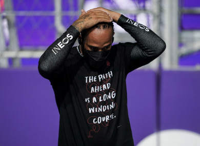 Disconsolate Hamilton knows it is over.