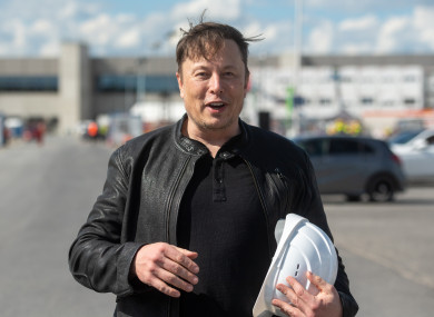 Elon Musk, Tesla CEO, stands on the construction site of the Tesla factory.