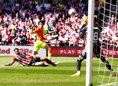 Brennan Johnson sees his shot saved.