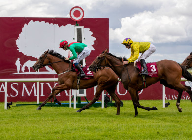 La Petite Coco striding to victory.
