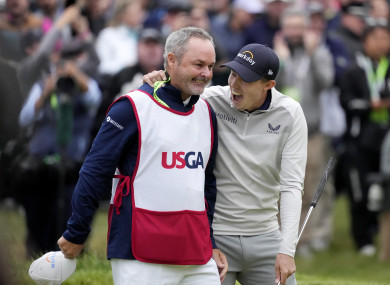 Matt Fitzpatrick celebrates with his caddie.