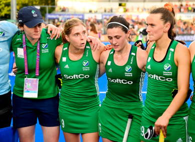 Ireland’s Kathryn Mullan talks to her team after the match.