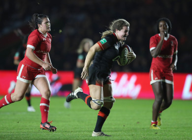 Jo Brown breaks away to score for England against Canada in 2017.