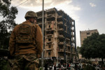 A Lebanese soldier secures the area where a building was targeted by an Israeli air strike in the area of Gallery Semaan on the outskirts of Beirut southern suburb, a stronghold of Hezbollah. One person was killed and 15 injured in the strike, according to the Lebanese ministry of health. 