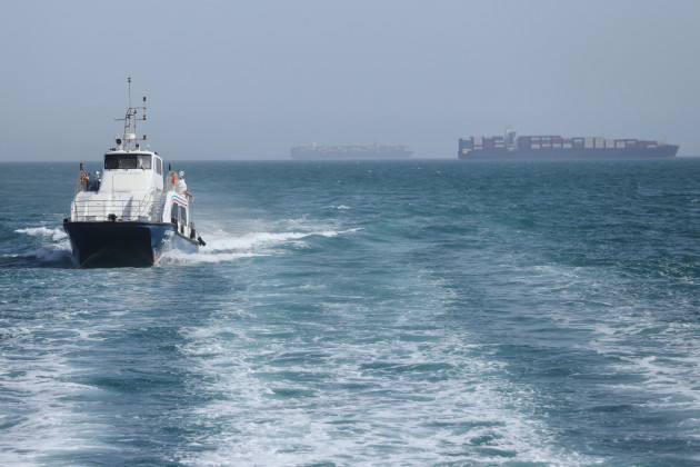 Trump pauses US operation to escort ships through Strait of Hormuz as he seeks Iran deal