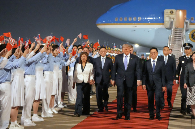 Trump touches down in China for high-stakes summit with Xi Jinping