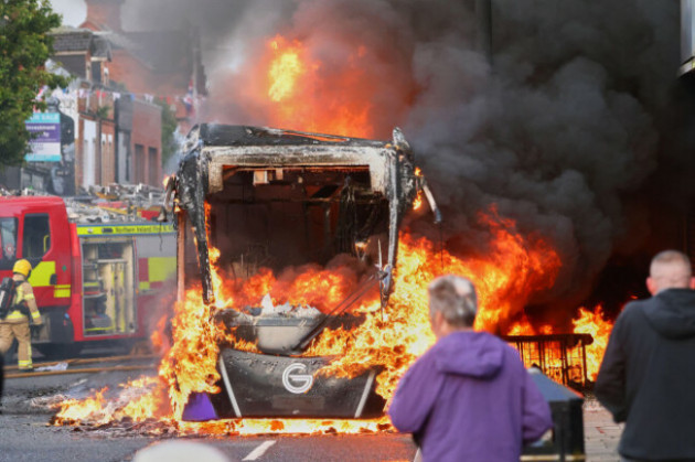 Man arrested in connection with bus set on fire during Belfast disorder