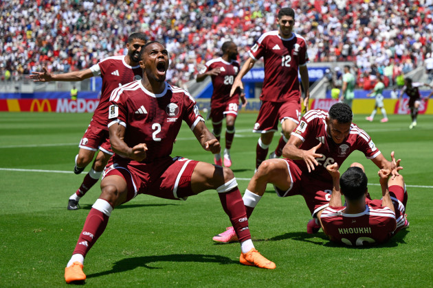 Qatar captain heads 94th-minute equaliser to earn country's first World Cup point