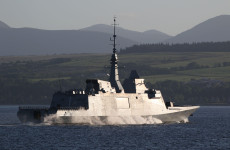 Warship moves to waters off Cork as French police join gardaí in land-based security operation