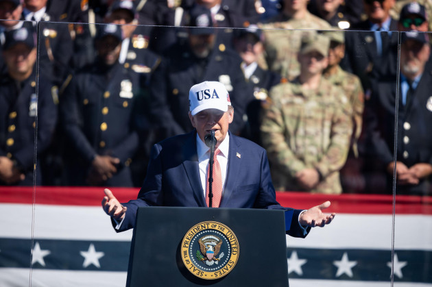 Trump retells disputed tale of being carried to safety by firefighters on 9/11